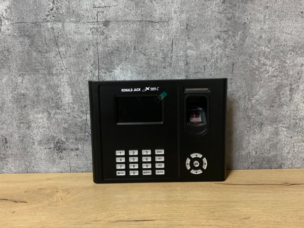 MÁY CHẤM CÔNG BẰNG DẤU VÂN TAY X989C ( + THẺ CẢM ỨNG+ PIN LƯU ĐIỆN ) RONALD JACK X989C